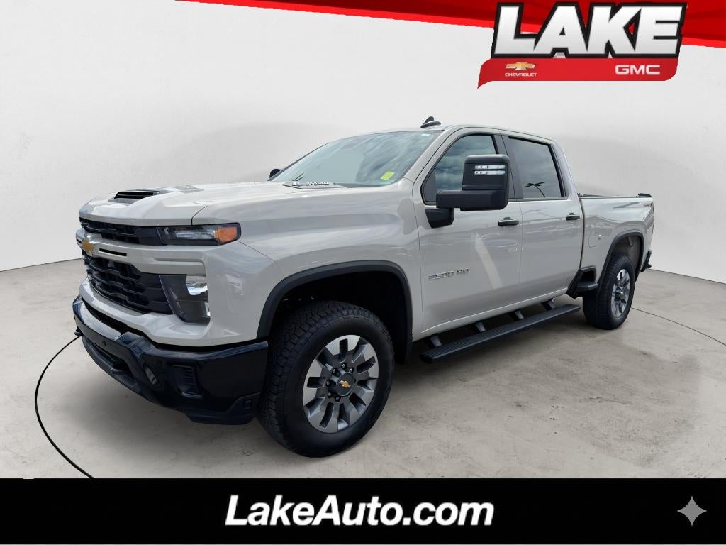 2026 Chevrolet Silverado 2500 HD Custom in White Sands — front three-quarter view