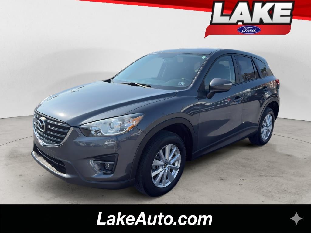 2016 Mazda Mazda CX-5 Touring in Meteor Gray Mica — front three-quarter view